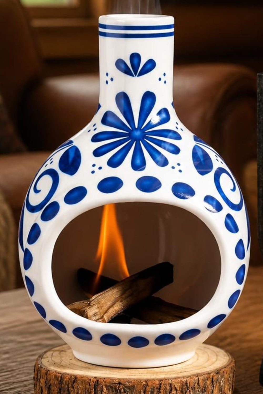 Hand-painted blue and white talavera ceramic mini chiminea incense burner with palo santo wood burning inside